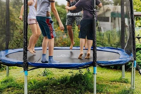 sheet supported by springs in a metal frame|Trampoline .